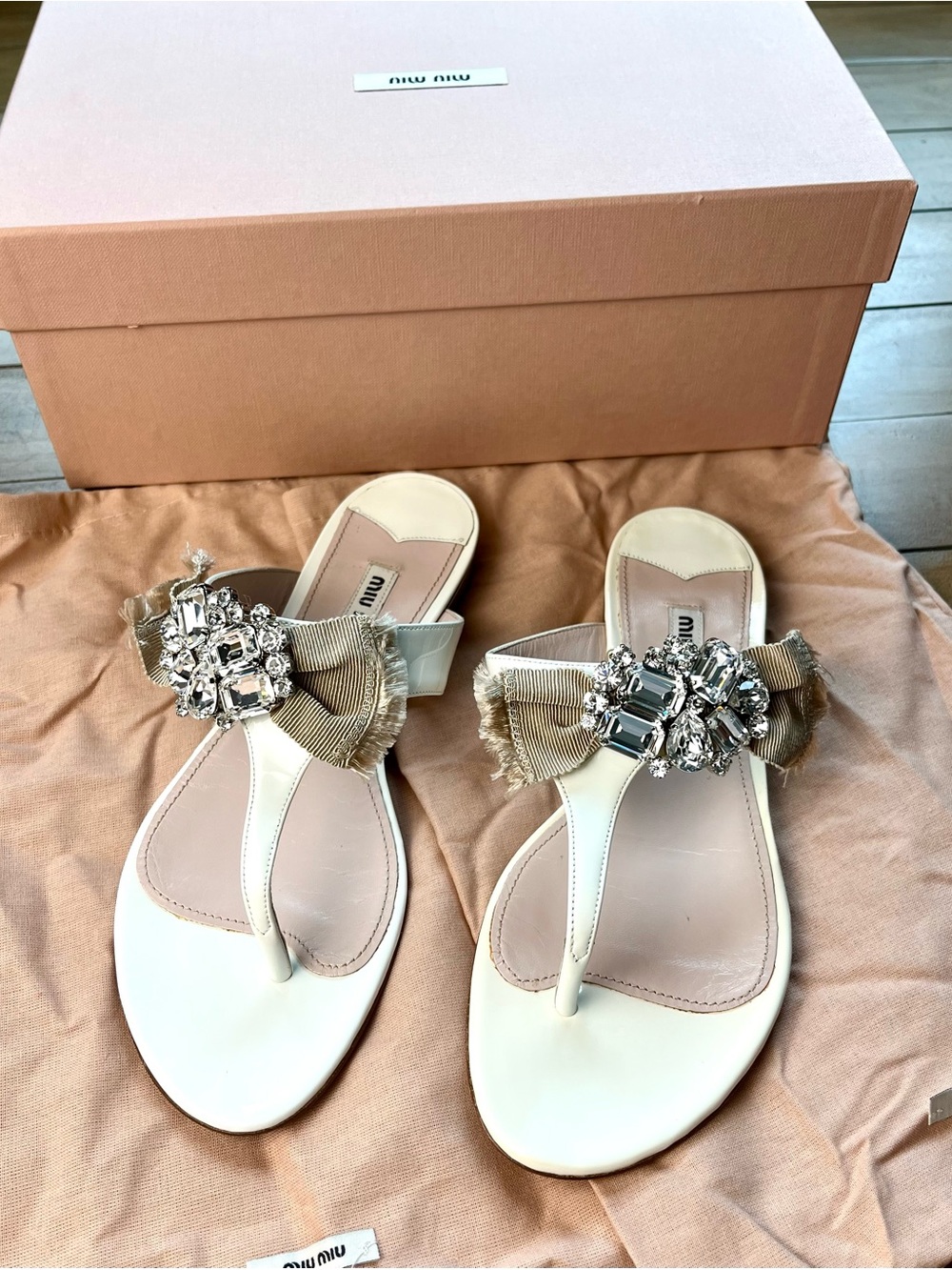 Miu Miu Ivory Leather Thong Sandals with Beige Bow and Crystal Cluster
